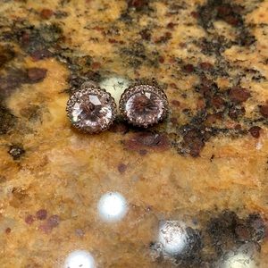 Earrings never worn. Simulated diamond studs.